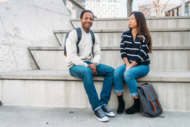 istock Friends having fun at  the university 1369124077