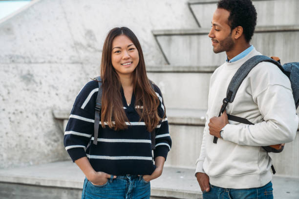 istock Friends having fun at  the university 1369124162
