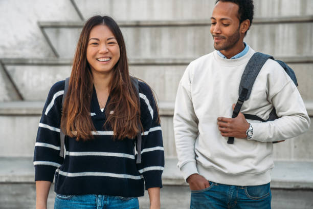 istock Friends having fun at  the university 1369124239