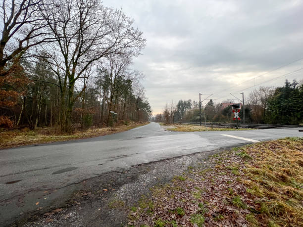 istock A road junction at the railway tracks in Germany. 1369124894