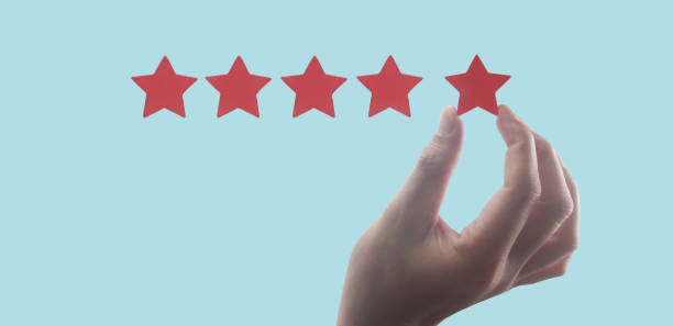 istock Rise on increasing five stars in human hand, Increase rating evaluation 1369125430