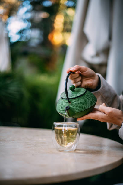 istock Woman Drinking Herbal Tea 1369126336