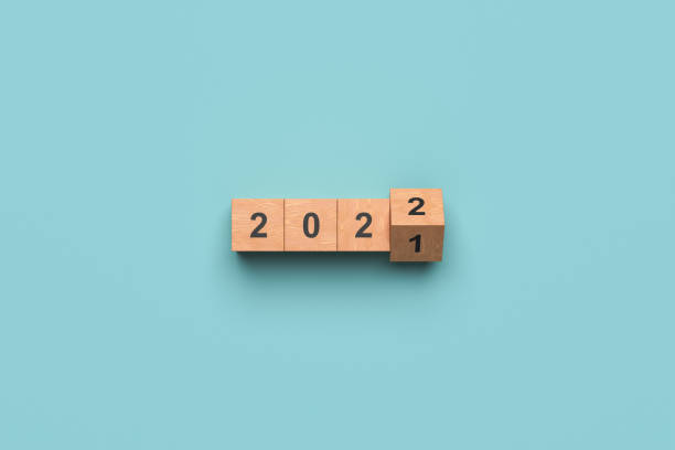 istock Wooden blocks from 2021 to 2022 on a blue background. 1369126944