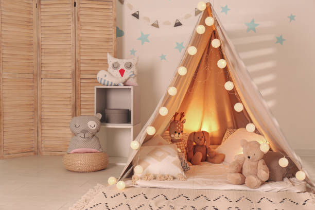istock Modern children's room interior with play tent and lights 1369127278