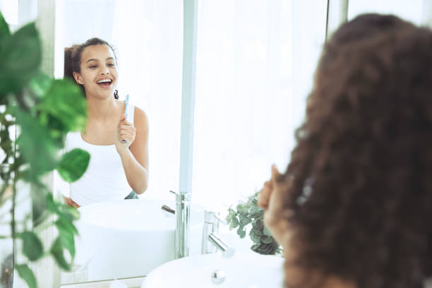 istock Teenager singing in the bathroom 1369129149
