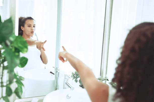 istock Teenager singing in the bathroom 1369129212