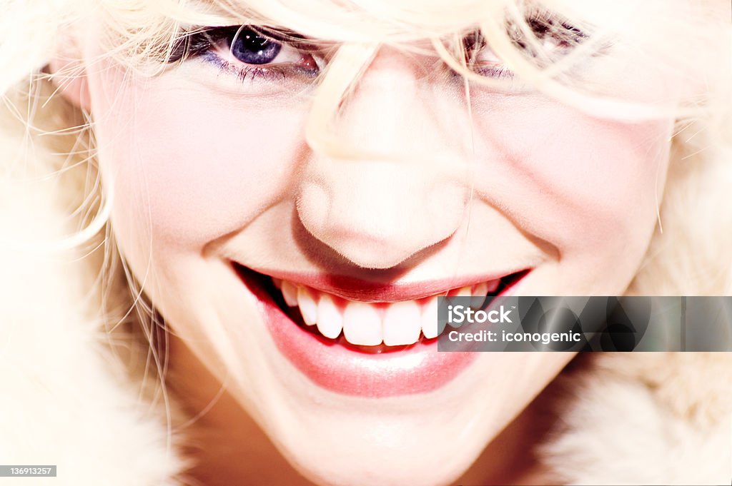 Glowing Smile Smilng face with blond curls around. Adult Stock Photo