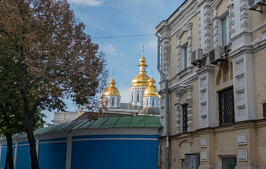 View from the Trekhsvyatitelskaya street in Kiev on the Mikhailovsky Golden-domed Cathedral in autumn