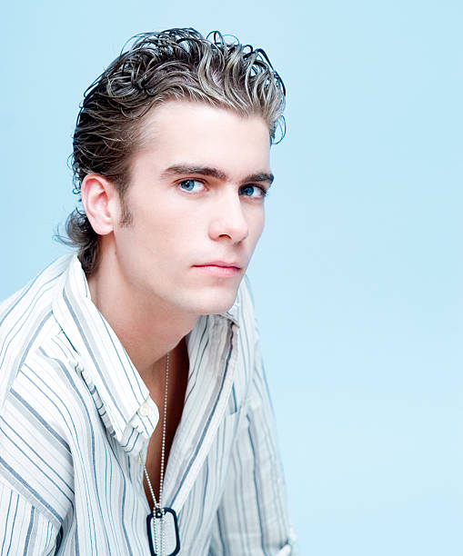 Young man, with a confident gaze.