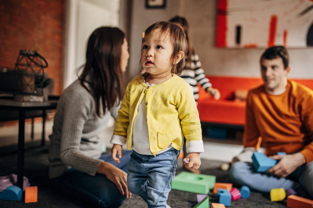 istock Happy family at home 1369136808