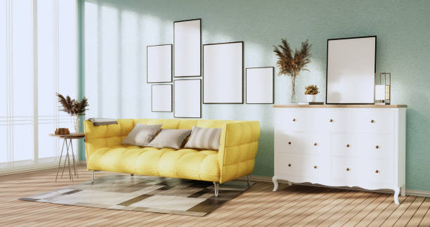 istock Mock up empty picture frame on the mint wall of the room.3D rendering 1369137372