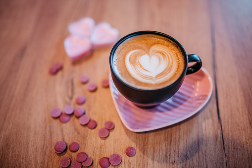 Coffee with heart shaped latte art, Valentine`s day concept.