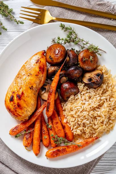 istock Chicken with rice, mushrooms and carrots 1369139486