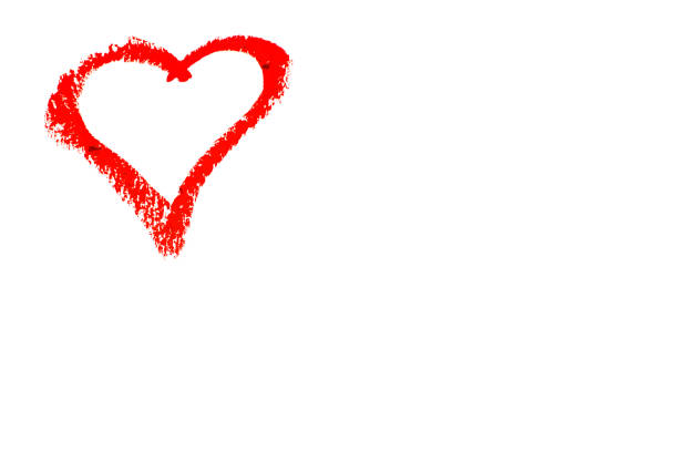istock Heart symbol drawn with red lipstick on a white background. 1369140687