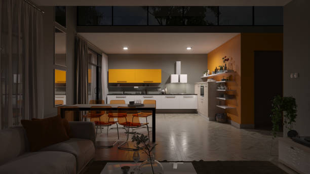 Illuminated Kitchen View from the Dark Living Room at Night