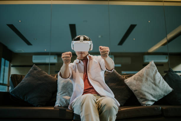 Fast drive, Asian man spending breaking time with virtual reality simulator at gaming room.