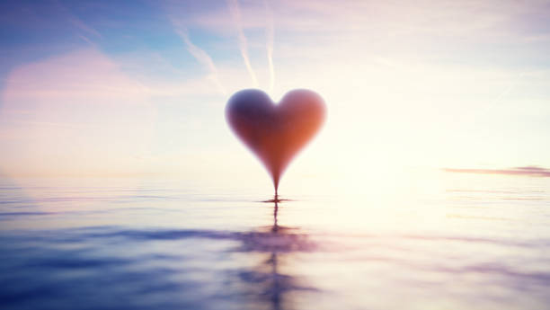 istock Heart reflection in water at sunset. Valentines day 1369144003