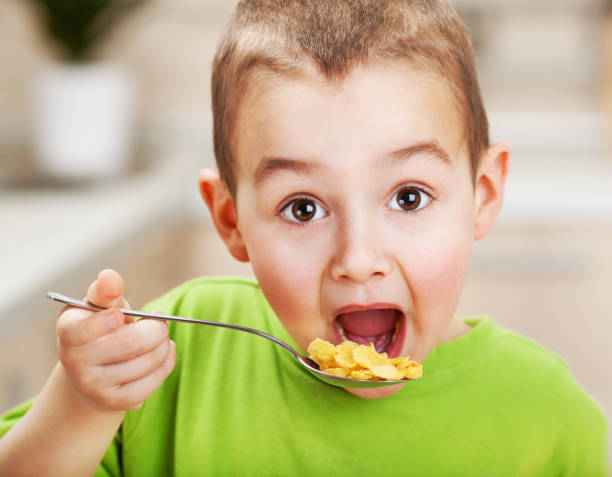 istock Cute little boy with open mouth 1369149940