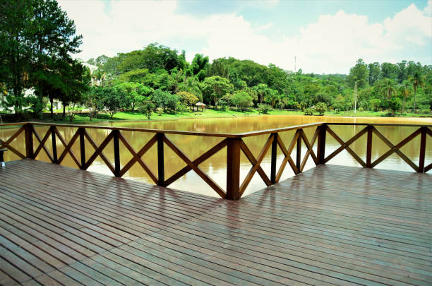 istock The wooden deck and the lake 1369151097