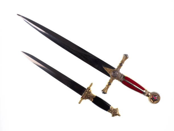 istock two knight swords isolated on white background 1369151419