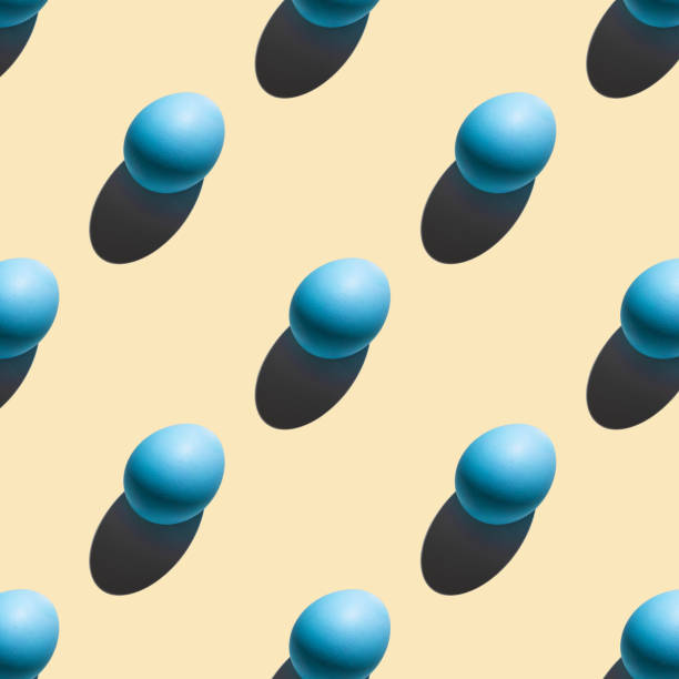 istock The pattern of their blue eggs with a hard shadow arranged diagonally on a light beige background 1369151632