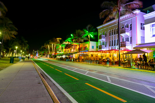 Miami Beach, FL, USA - February 2, 2022: New green painted two way bike lanes on Ocean Drive