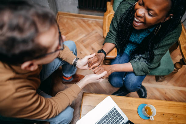 istock Happy loving couple in a cafe 1369154163