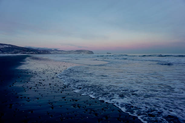 istock Beautiful Khalaktyrsky beach in winter 1369154935