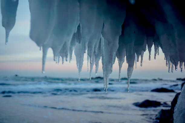 Icicles under a rock near the Pacific ocean in Kamchatka