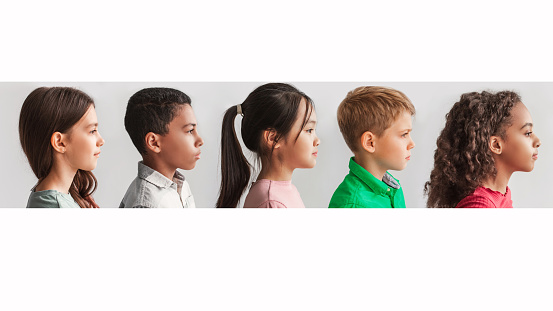 Collage Of Multicultural Preteen Kids Profile Portraits Looking Aside Posing Over White Studio Background. Serious Diverse Boys And Girls Headshots, Side View. Childhood And Diversity. Panorama