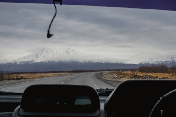 istock Road and Koryaksky Volcano in Kamchatka 1369156533