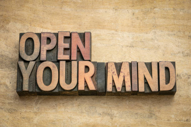 istock open your mind word abstract in wood type 1369156922