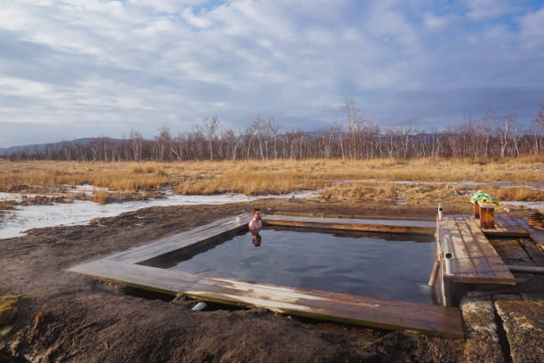istock A guy in a natural thermal spring in Kamchatka 1369156926