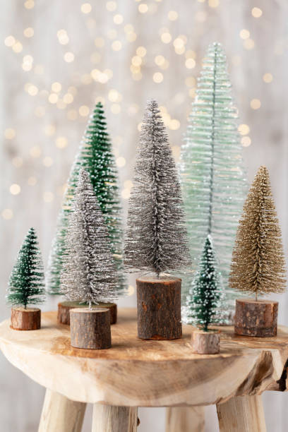 istock Christmas tree on bohek wooden, bokeh background. 1369159943