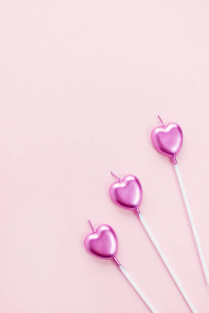 istock heart shaped cake candle. Valentine's day background. top view, empty place for your text 1369162409