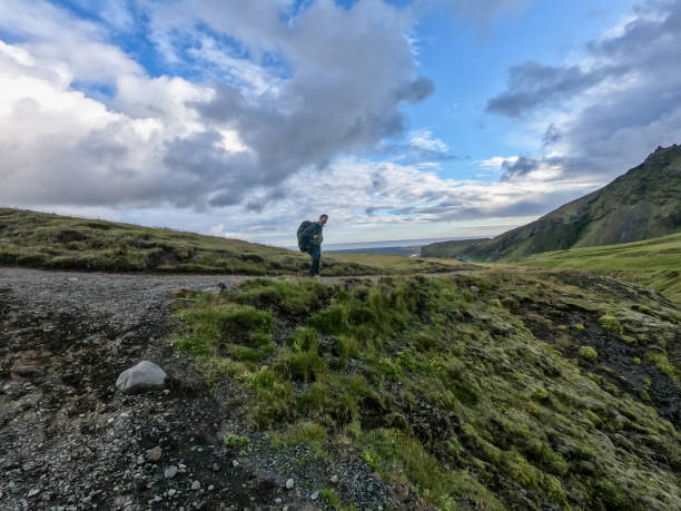 istock One man on a hiking trail in Iceland 1369163035