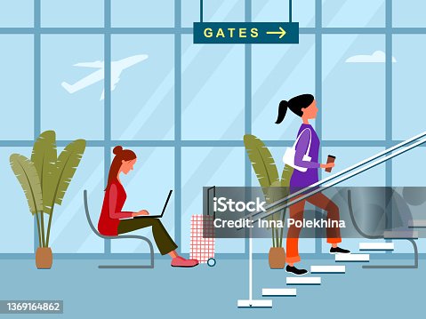 istock brunette is sitting in a chair and studying at a laptop, a brown-haired woman is climbing the stairs in the airport terminal 1369164862