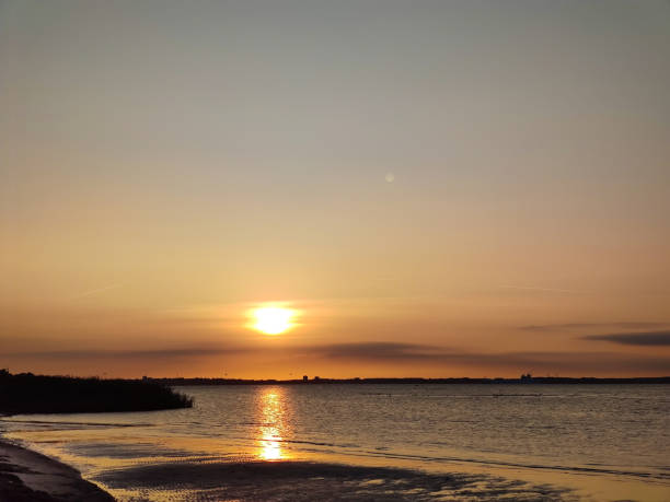 istock Seascape  with sunset at Baltic sea in north Germany 1369166052
