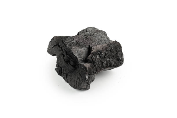 istock Black oak coal isolated on white background. 1369166218