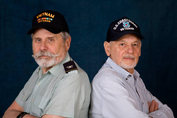 istock Retired Veterans looking at camera arms crossed 1369166304