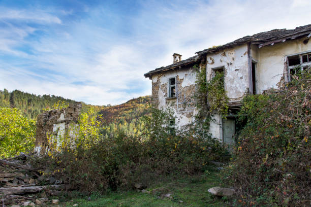 istock Destroyed houses. Destructive abandoned homes in the mountains. 1369168438