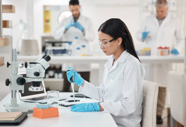istock Shot of a young scientist working with samples in a lab 1369169227