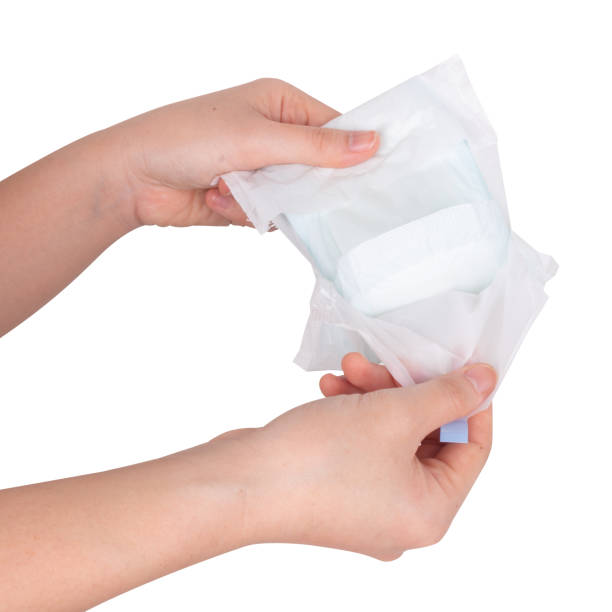 istock sanitary pad hand isolated on white background 1369169838