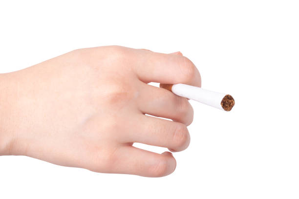 istock cigaret  woman hand isolated on white background 1369169927