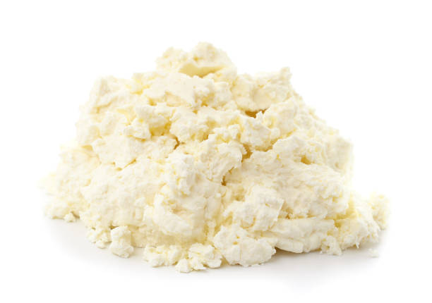 istock Heap of white cottage cheese. 1369173920