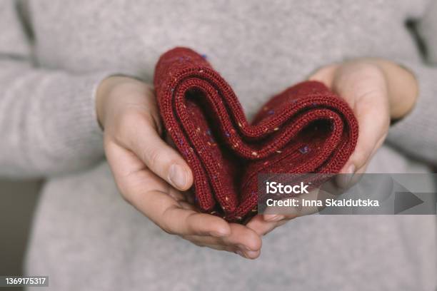 Woman With Knitted Socks In Her Hands Concept For Handmade And Hygge Slow Life Stock Photo - Download Image Now