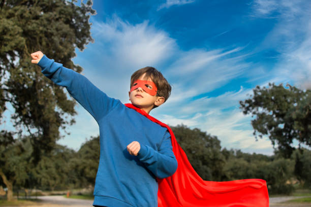 istock Child Superhero Portrait, Power Concept. 1369175411