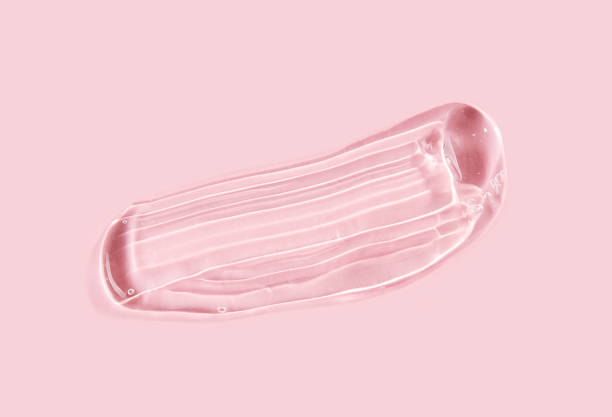 istock Liquid transparent gel smudge (or antibacterial or serum gel) on a pink background. 1369175461