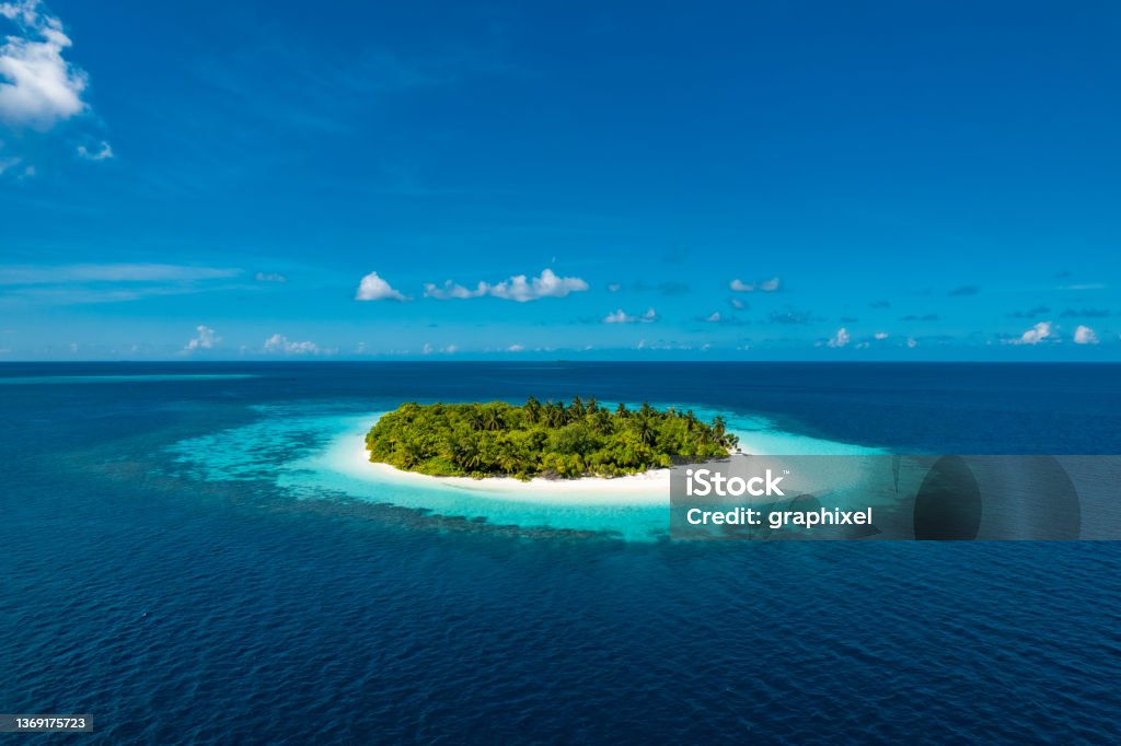 Isolated tropical island middle of ocean Maldives Stock Photo