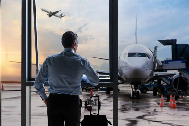 Man Waiting for Flight in Airport Lounge